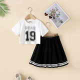 Girls Alphanumeric Printed Crop Top With Black Skirt