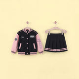 Girls Pink Alphanumeric Printed Varsity Jacket With Pleated Skirt Sets