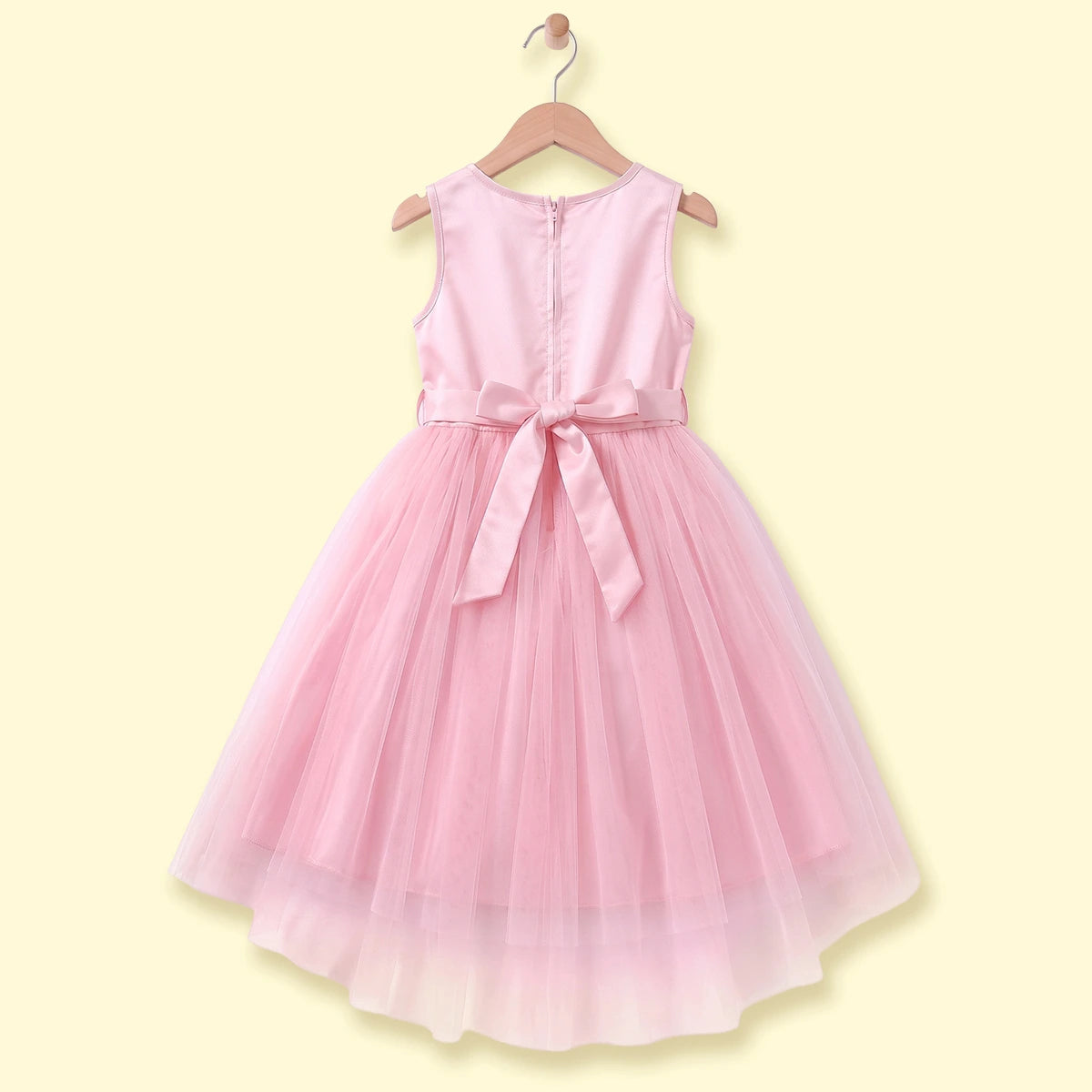 Girls light pink sleeveless high-low party dress with sequin floral applique