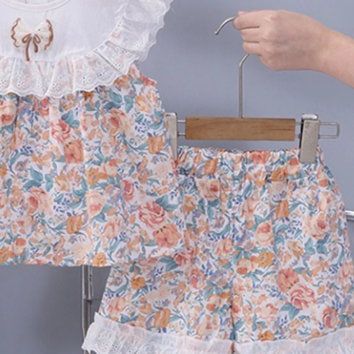 Girls Multicolor Floral Printed Eyelet Ruffle Top With Elasticated Shorts Sets 2 pc. Sets