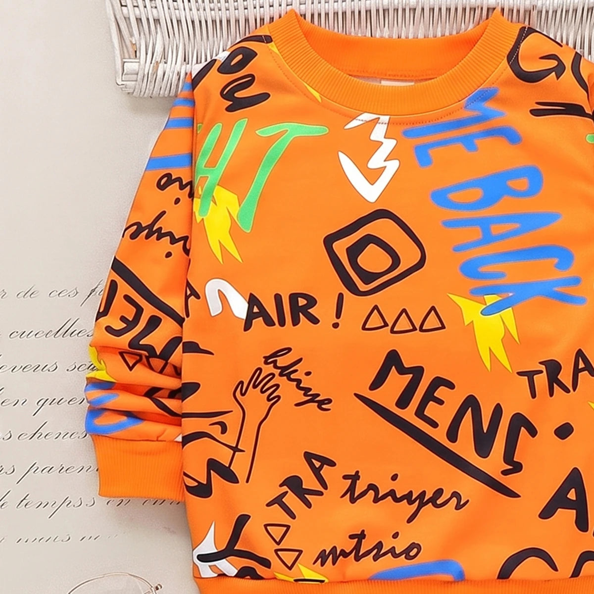 Boys orange typographic long sleeve sweatshirt and black joggers set