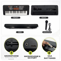 Young boy playing a black 37-key electronic piano keyboard with an attached microphone