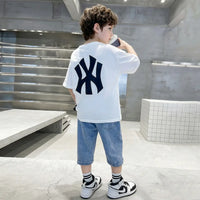 Boys White Printed Drop Shoulder T-Shirt With Denim Capri Sets Sets