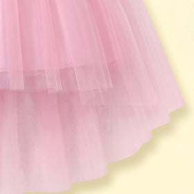Girls light pink sleeveless high-low party dress with sequin floral applique