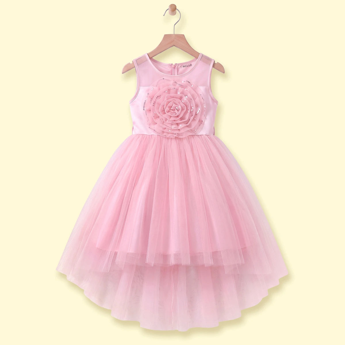 Girls light pink sleeveless high-low party dress with sequin floral applique