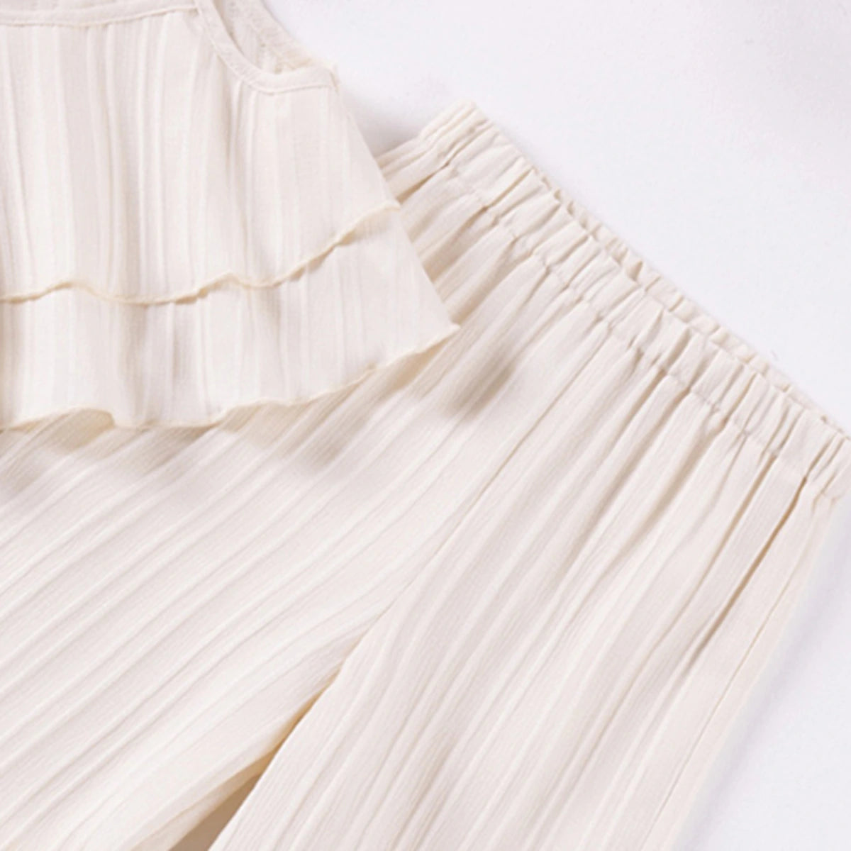 Girls Off White Self Stripes Sleeveless Tiered Top With Pants Co-ord Sets Sets