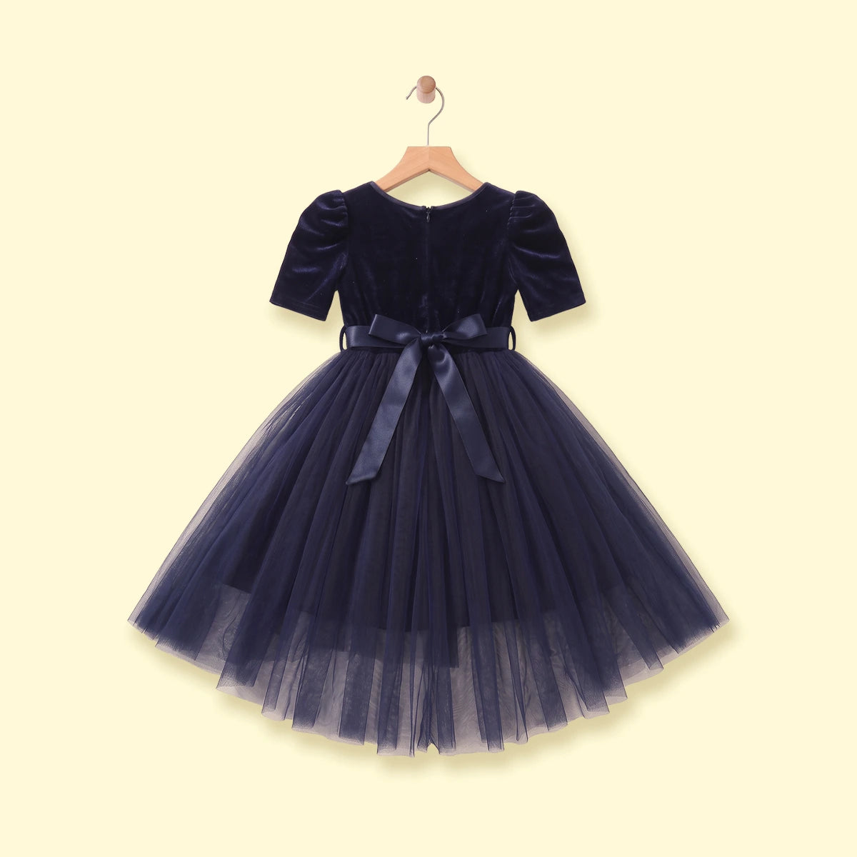 Girls navy blue party dress with puff sleeves and bow