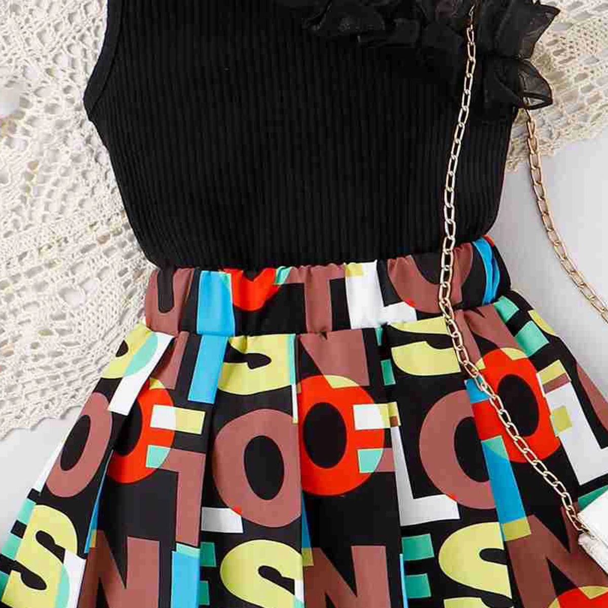 Girls Black Ruffle Neck One-Shoulder Top With Skirt Sets 2 pc. Sets