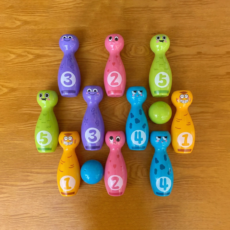 Colorful numbered bowling pins and balls for kids activity game