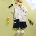 Boys Beige Embroidered Short Sleeve Shirt With Navy Shorts Sets 2 pc. Sets Beige 6-12 M