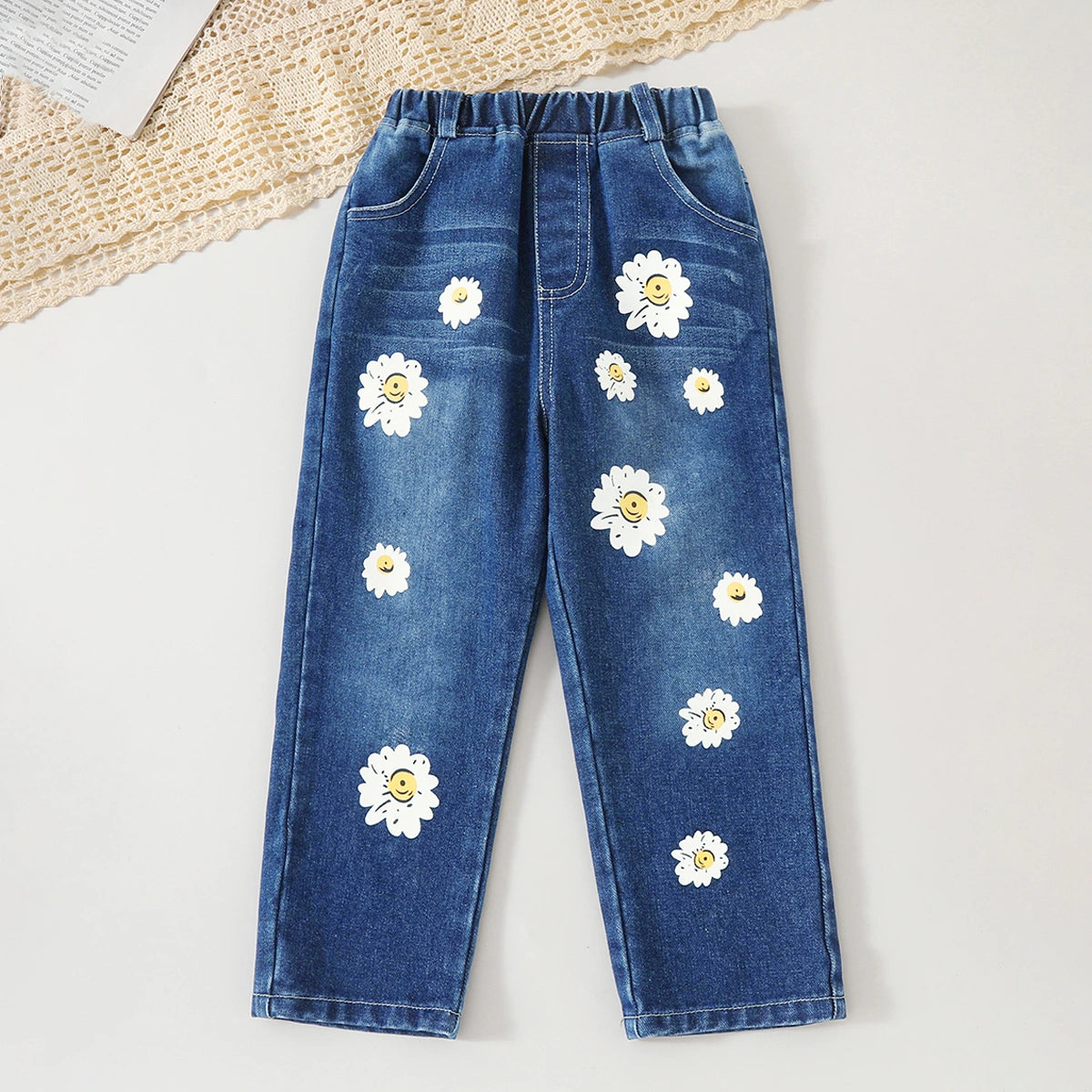 Girls Sky Blue Graphics Top With Floral Printed Denim Pants Set Sets