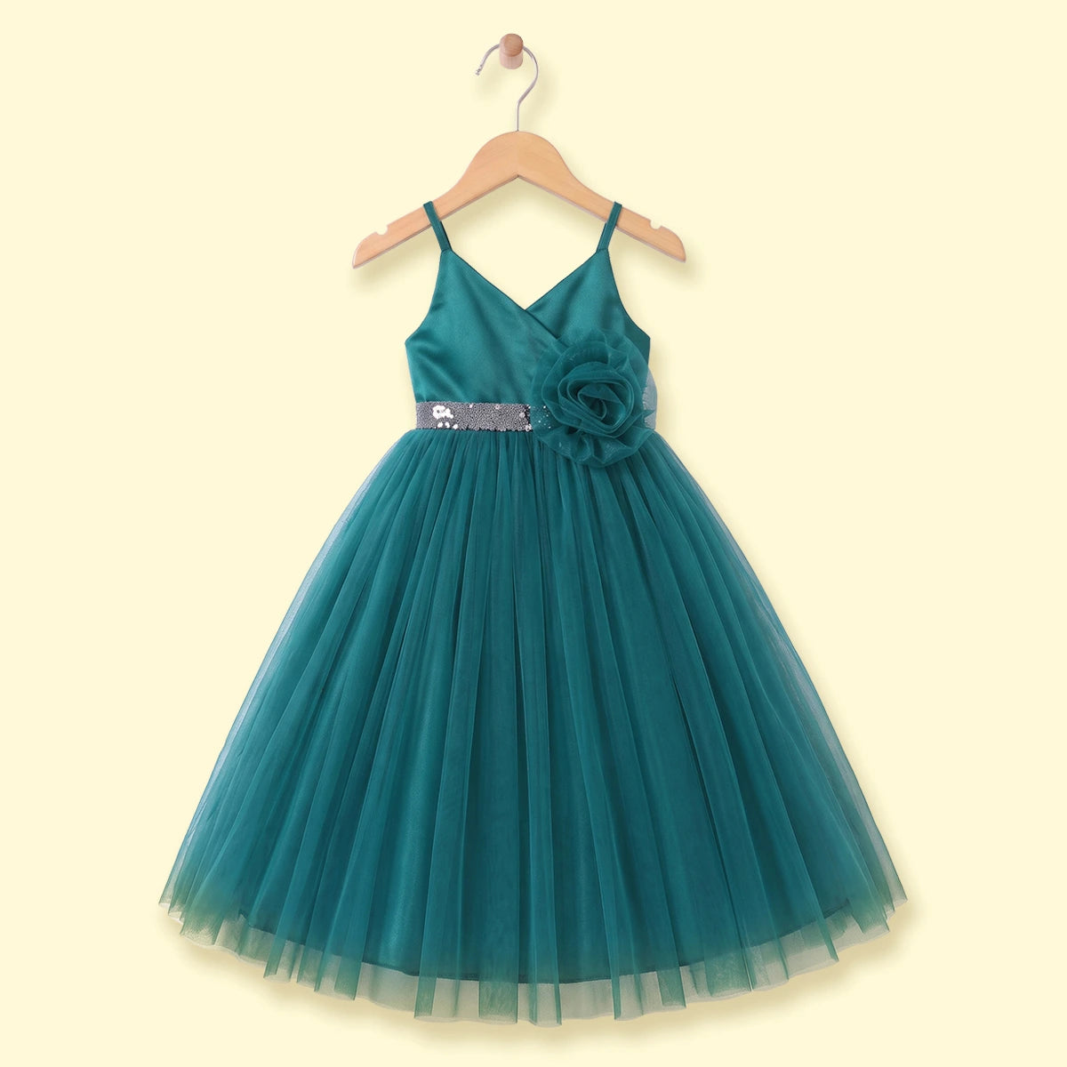 Girls green sleeveless party gown with sequin waist and tulle