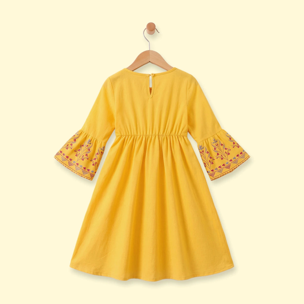 Buy Yellow Ethnic Motifs Dress for Girls │ INCLUD