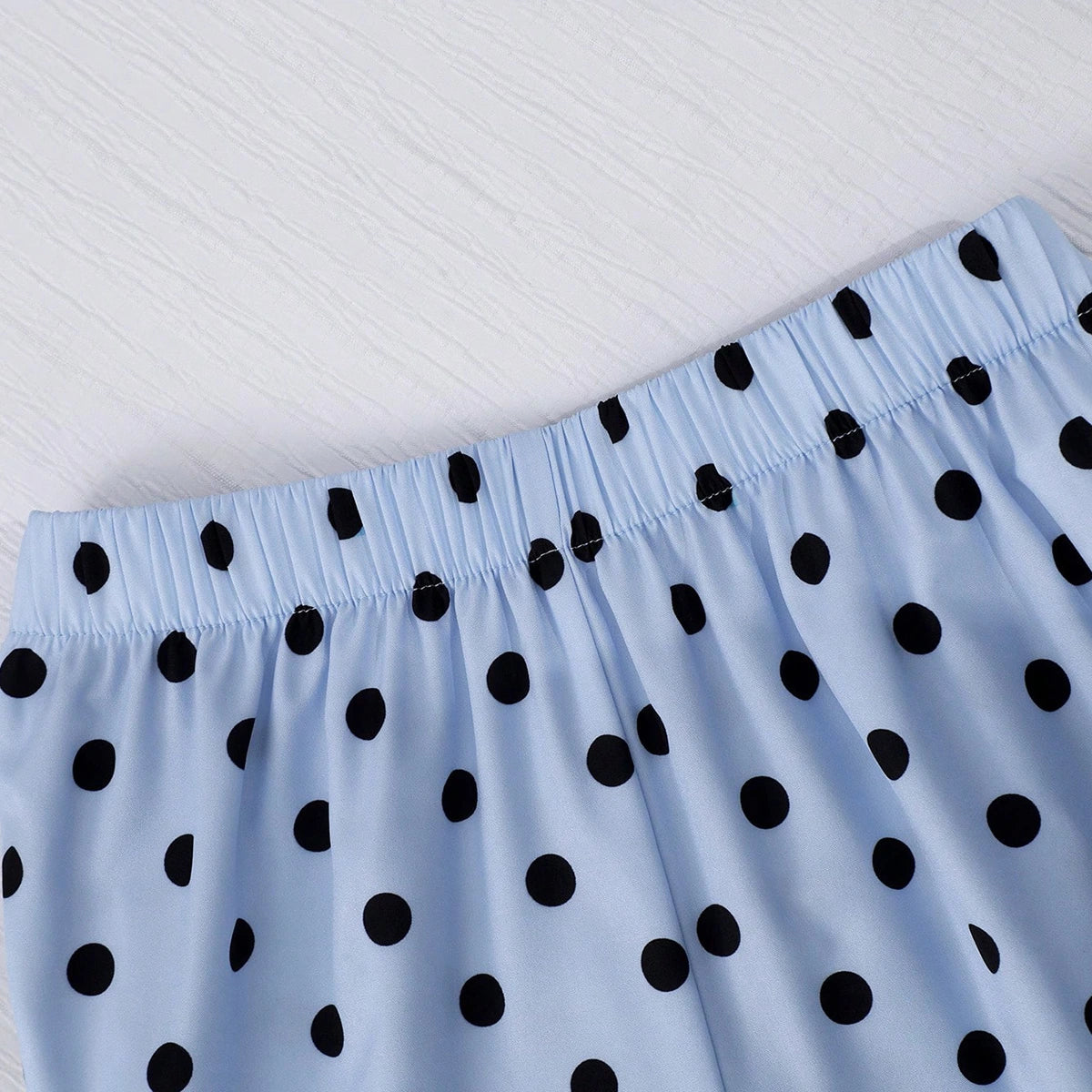 Girls Blue Sleeveless Top With Polka Dot Print Flared Pants Sets Sets