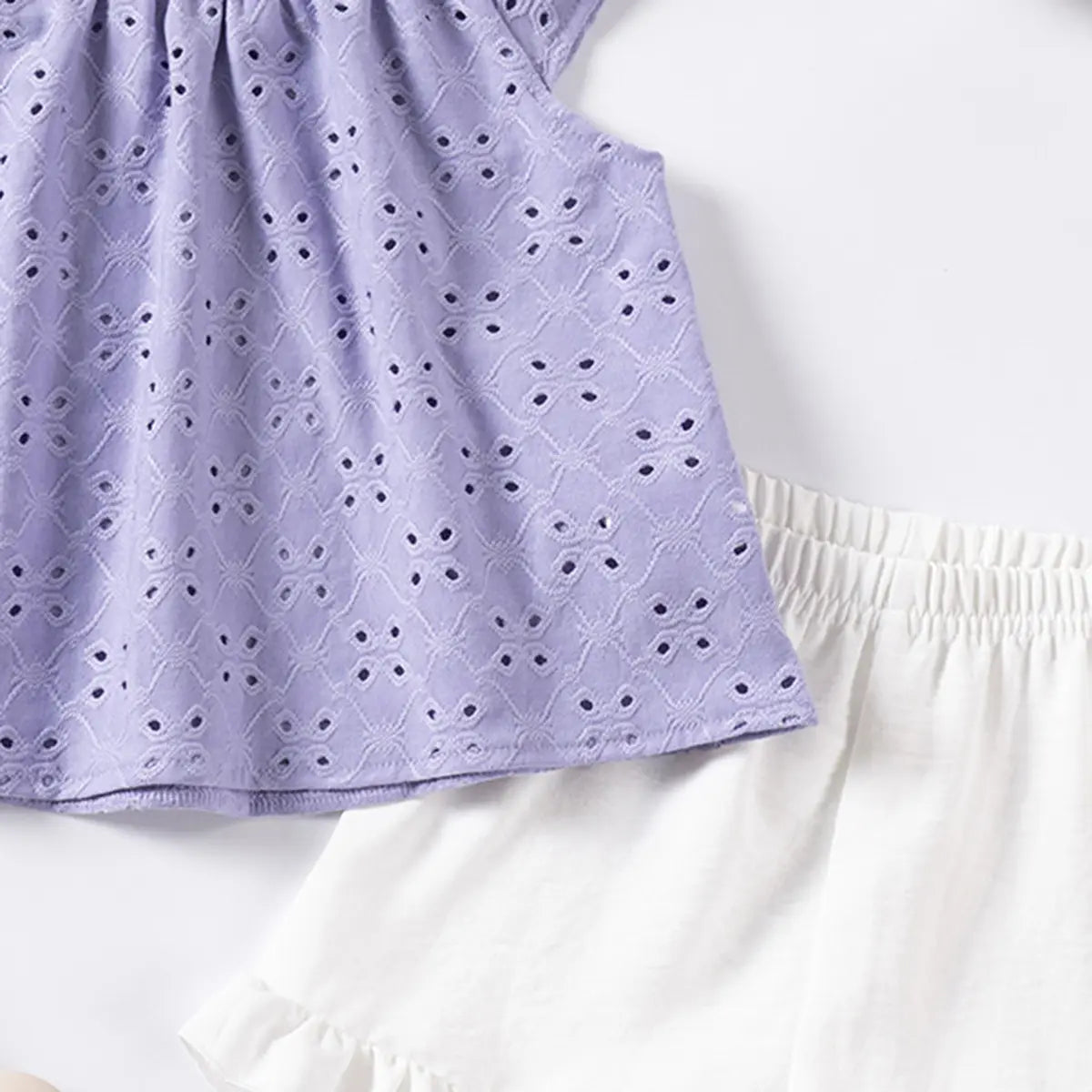 Girls Purple Eyelet Embroidered Top With Ruffle Hem Shorts Set Sets