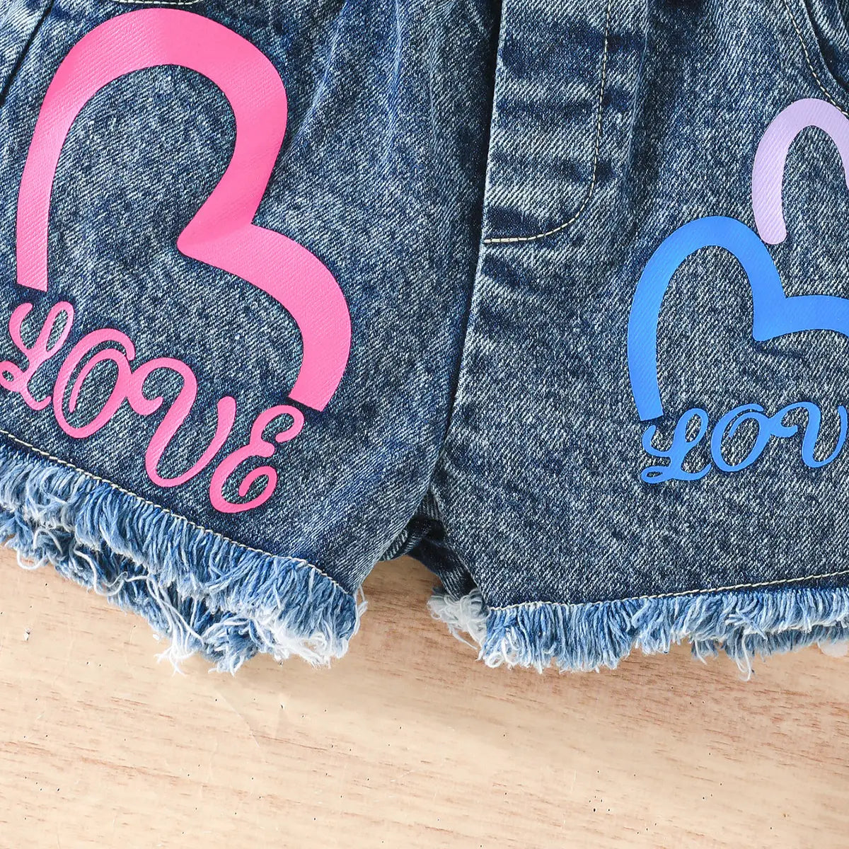 Girls Fuchsia Ruffle One-Shoulder Top With Heart Printed Denim Shorts Sets Sets