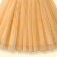 Girls yellow sleeveless party gown with sequined bodice and floral applique
