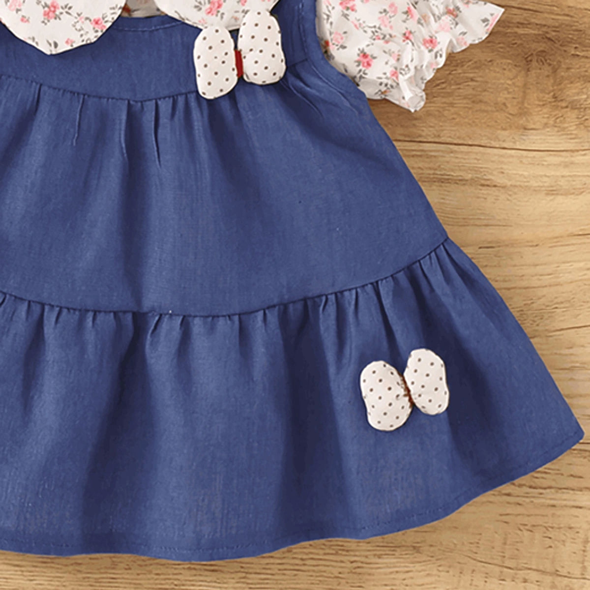 Girls Blue Solid Sleeveless Tiered Dress With Floral Printed Inner Top Casual Dresses