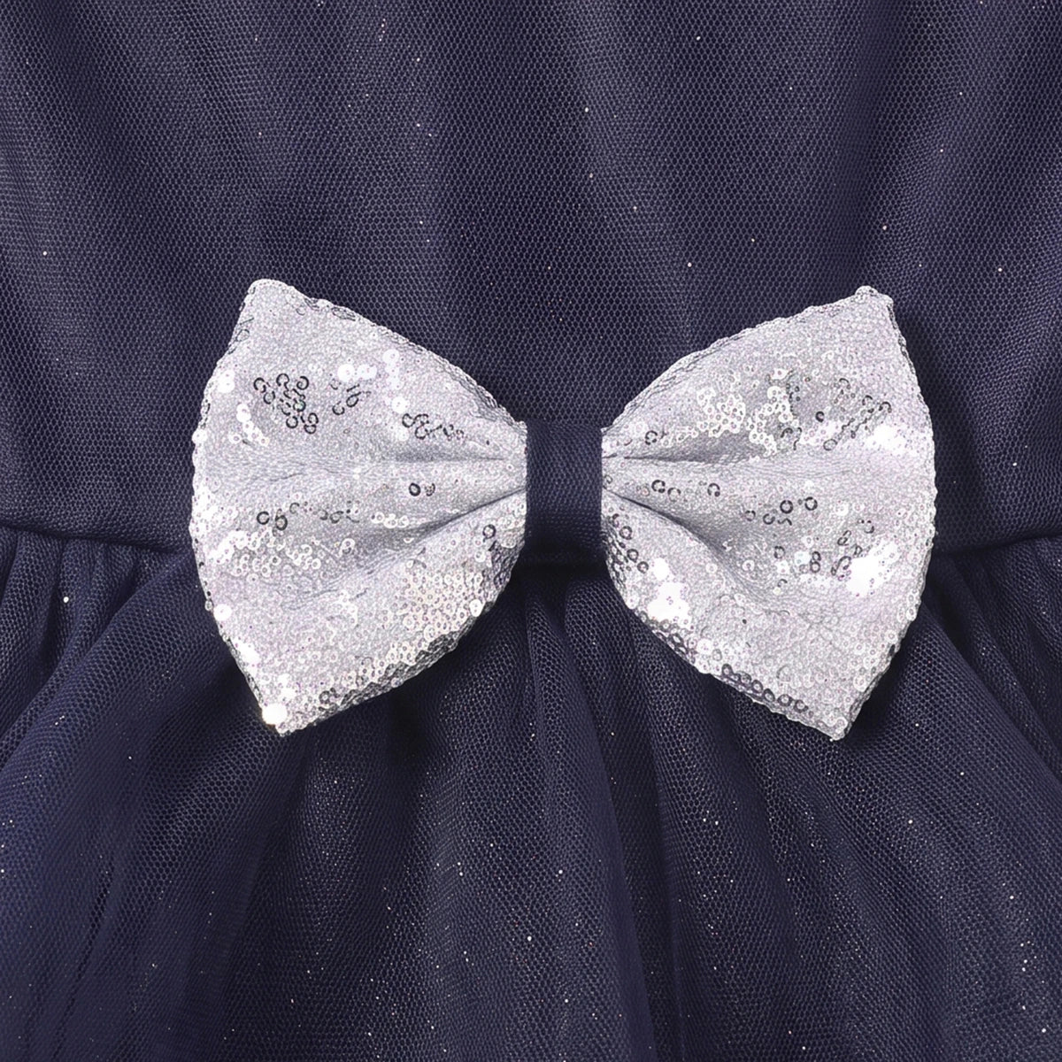 Girls navy blue party gown featuring puff sleeves and sequins