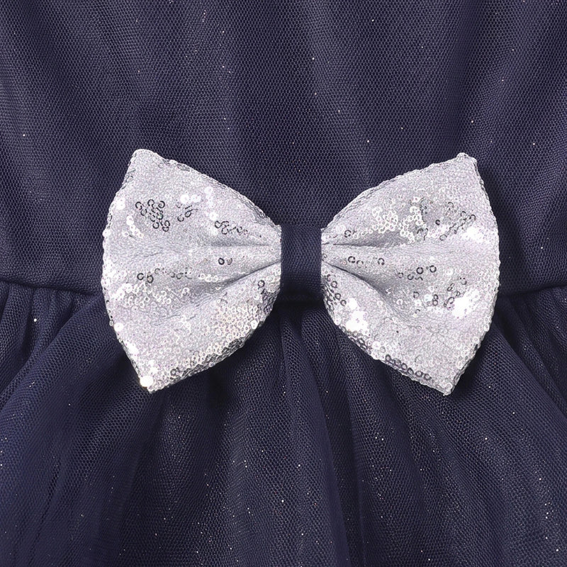 Girls navy blue party gown featuring puff sleeves and sequins