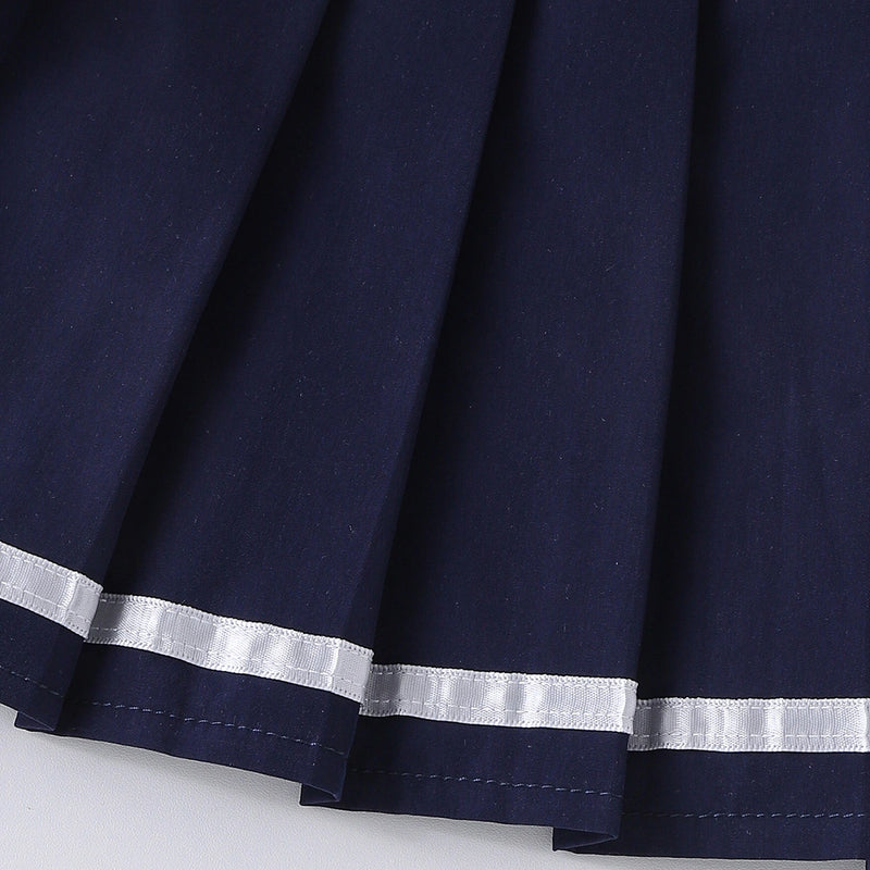 Girls Heart Embroidered Polo Top With Navy Blue Pleated Skirt Sets 2 pc. Sets
