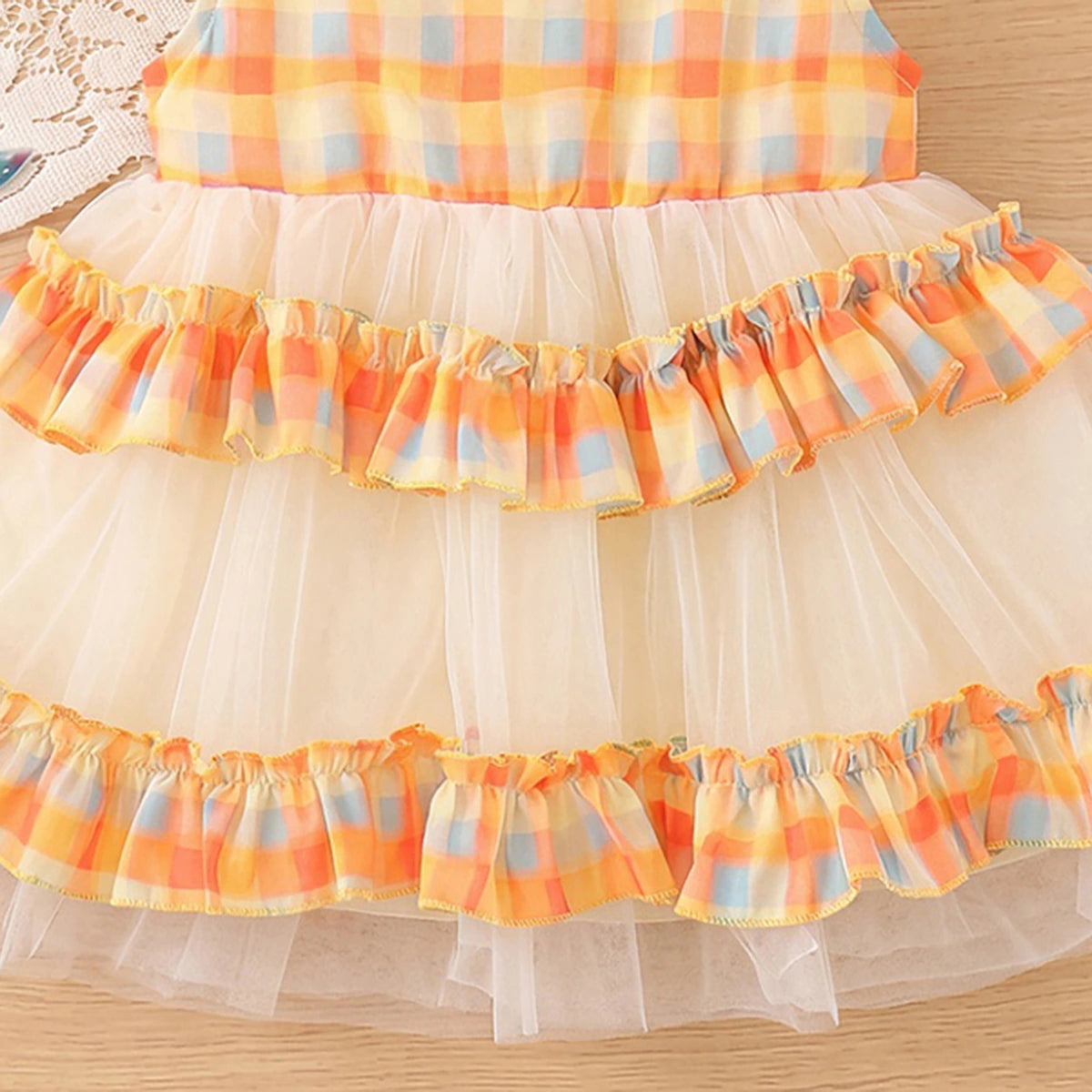 Girls Orange Checked Sleeveless Tiered Dress Casual Dresses