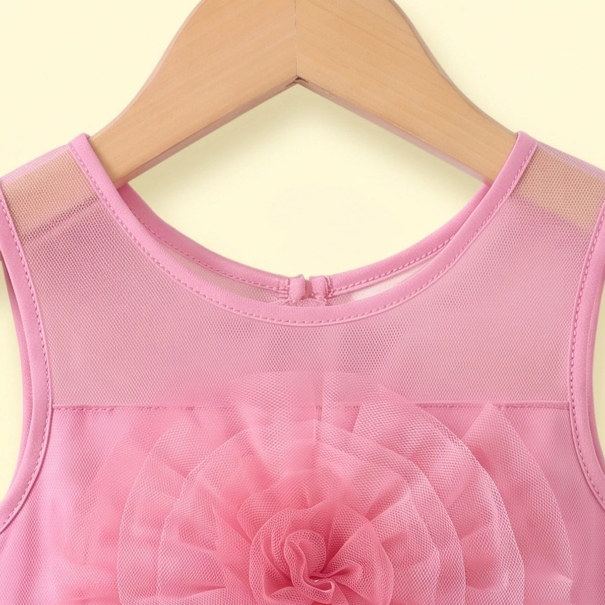 Girls pink sleeveless party gown with floral applique and tulle