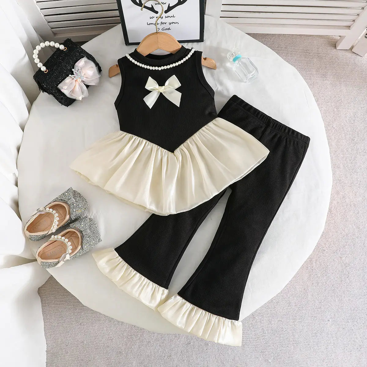 Girls Black Sleeveless Bow Applique Frill Top With Ribbed Pants Sets 2 pc. Sets Black 2-3 Y
