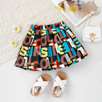 Girls Black Ruffle Neck One-Shoulder Top With Skirt Sets 2 pc. Sets