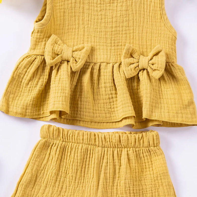 Girls Yellow Textured Bow Applique Peplum Top With Shorts Co-ord Sets Sets