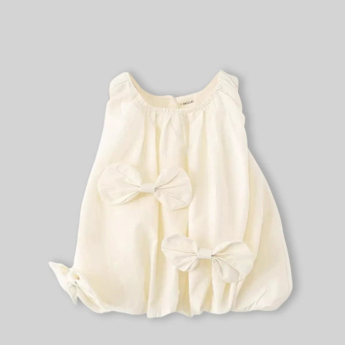 Girls Off White Solid Sleeveless Balloon Dress With Bow Details Casual Dresses