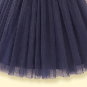 Girls navy blue party gown featuring puff sleeves and sequins