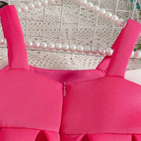 Girls Fuchsia Sleeveless Fit & Flare Party Wear Dress With Embellished Bow Applique Party Dresses