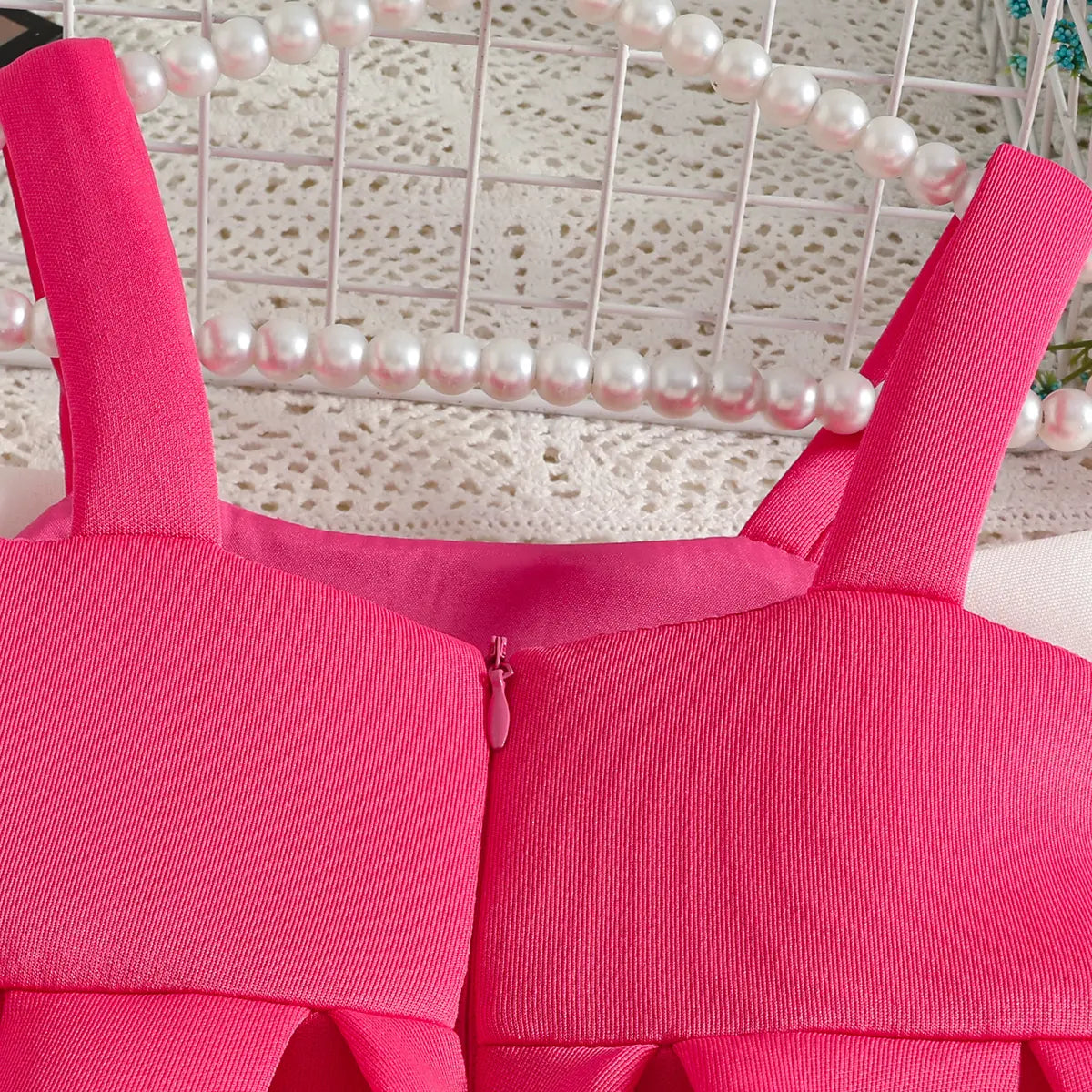 Girls Fuchsia Sleeveless Fit & Flare Party Wear Dress With Embellished Bow Applique Party Dresses
