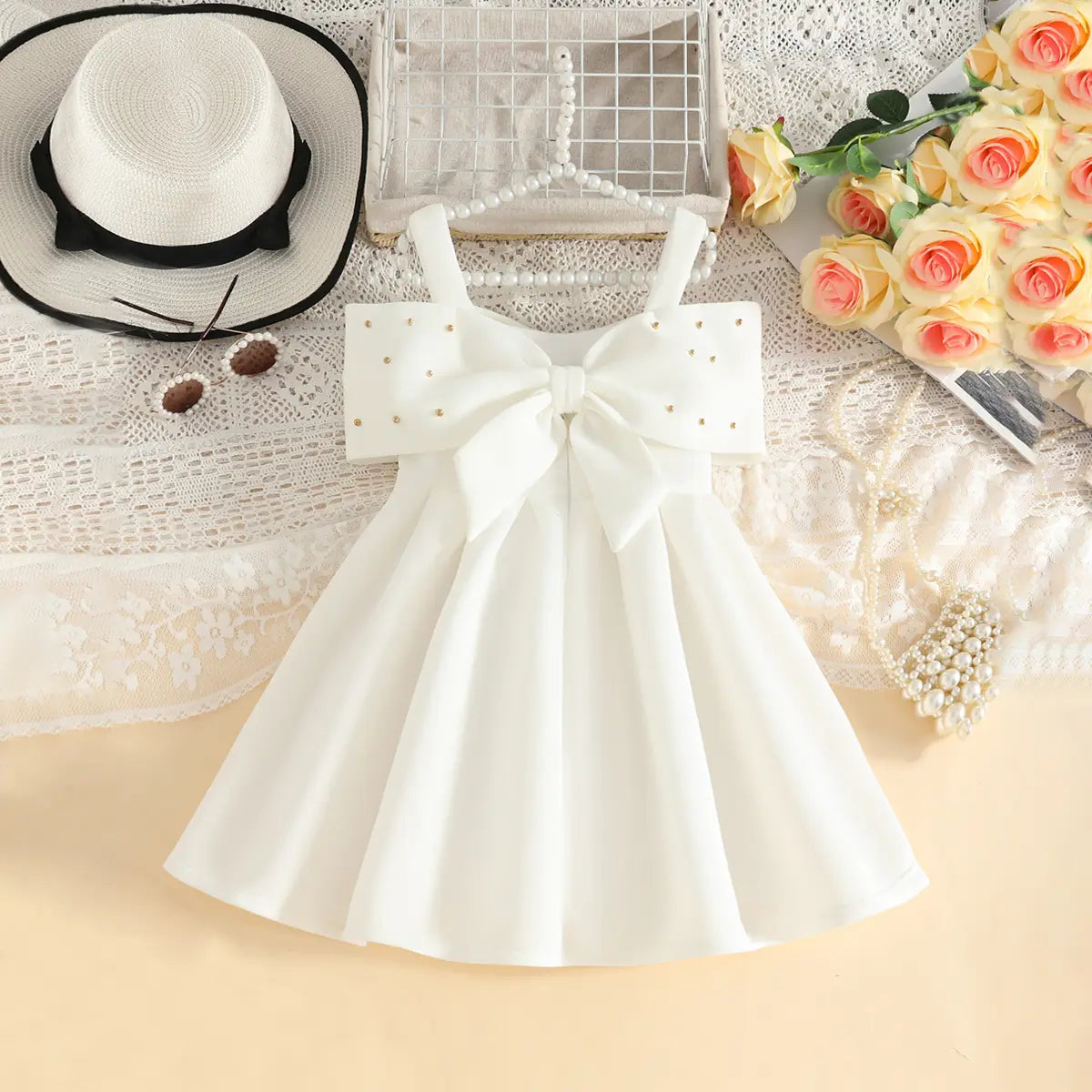 Girls White Sleeveless Fit & Flare Party Wear Dress With Elegant Bow Detail Party Dresses