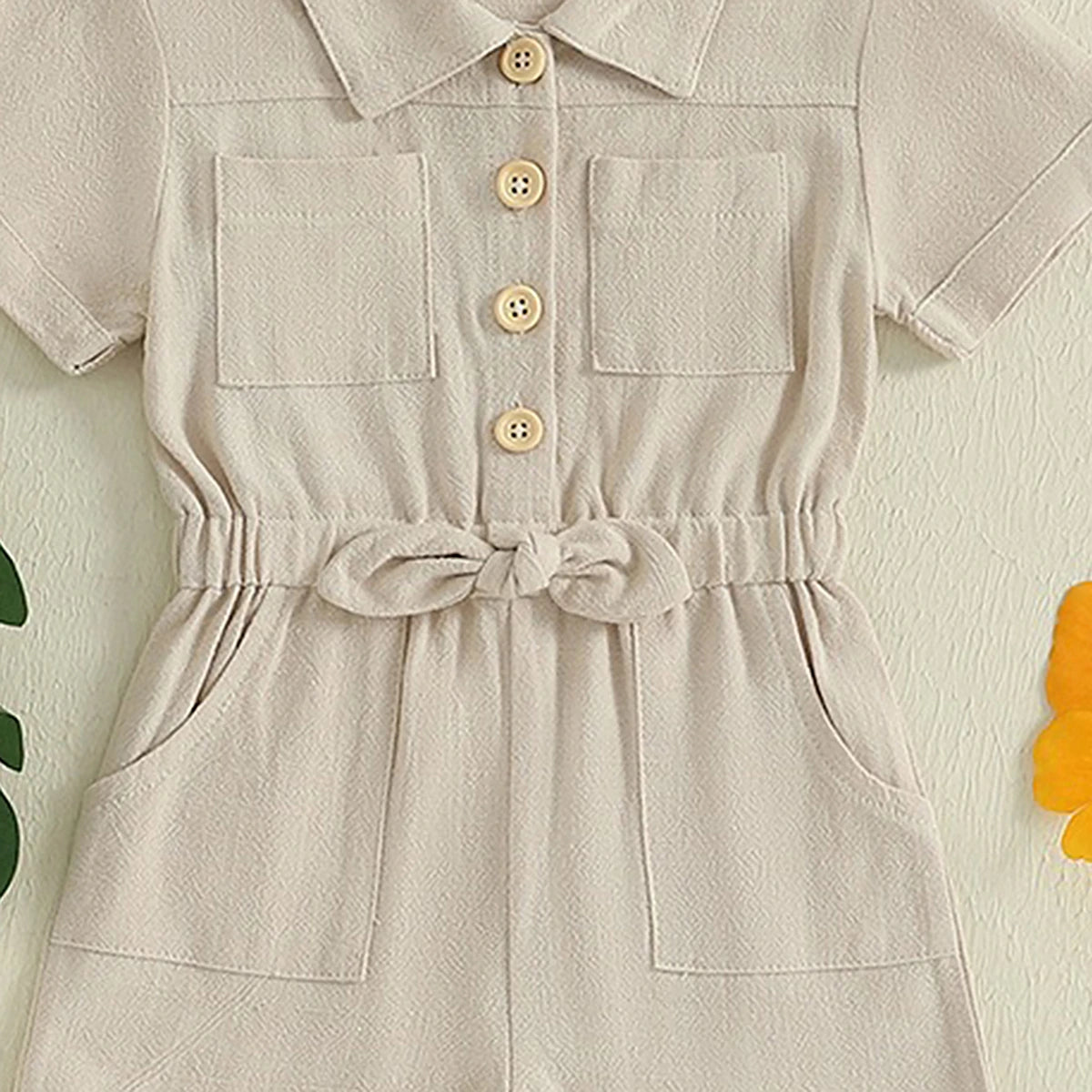 Girls Beige Button Front Short Sleeve Romper With Bow Detail Playsuits