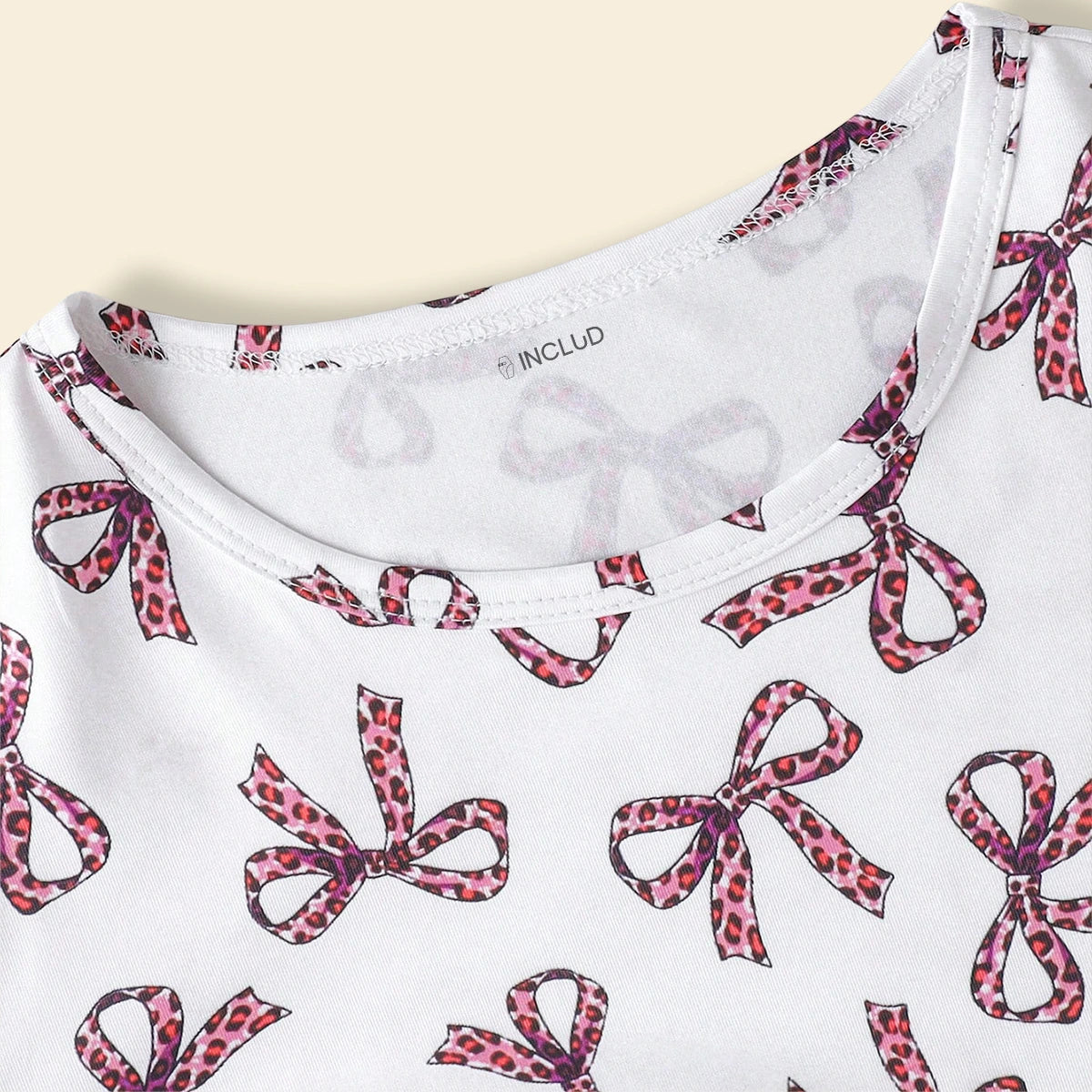 Girls White All-over Bow Print Top With Flared Pants Sets Sets