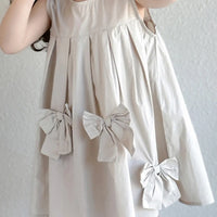 Girls Beige Pleated Sleeveless A-Line Dress With Bow Details Casual Dresses
