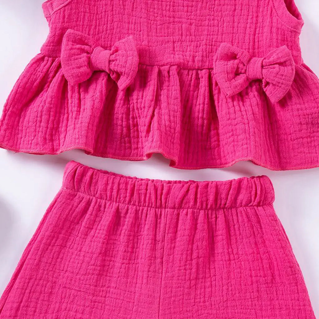 Girls Fuchsia Textured Bow Applique Peplum Top With Shorts Co-ord Sets Sets