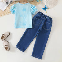 Girls Sky Blue Graphics Top With Floral Printed Denim Pants Set Sets