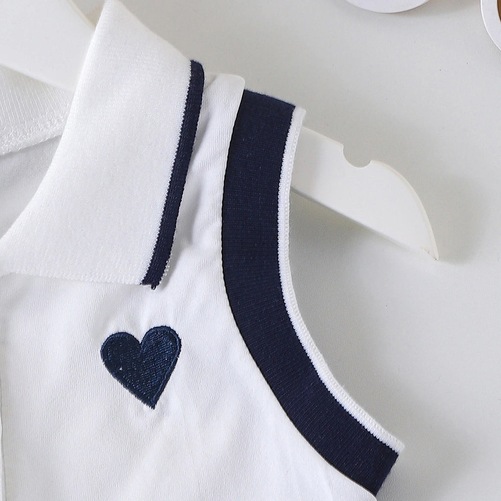 Girls Heart Embroidered Polo Top With Navy Blue Pleated Skirt Sets 2 pc. Sets