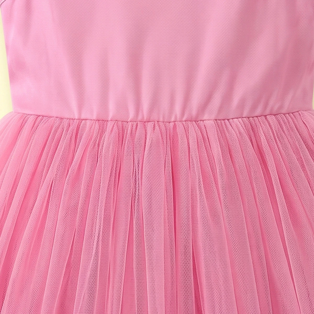 Girls pink sleeveless party gown with floral applique and tulle