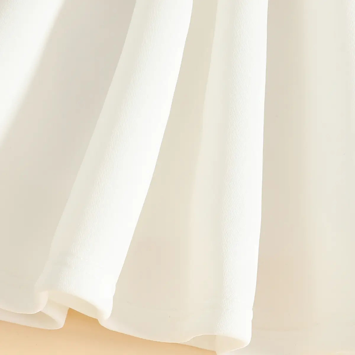 Girls White Sleeveless Fit & Flare Party Wear Dress With Elegant Bow Detail Party Dresses