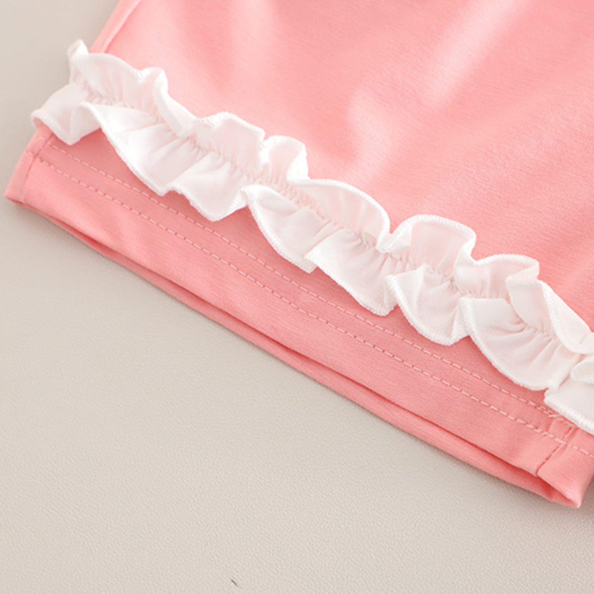 Girls Pink Printed Raglan Sleeves T-Shirt With Ruffled Shorts Set 2 pc. Sets
