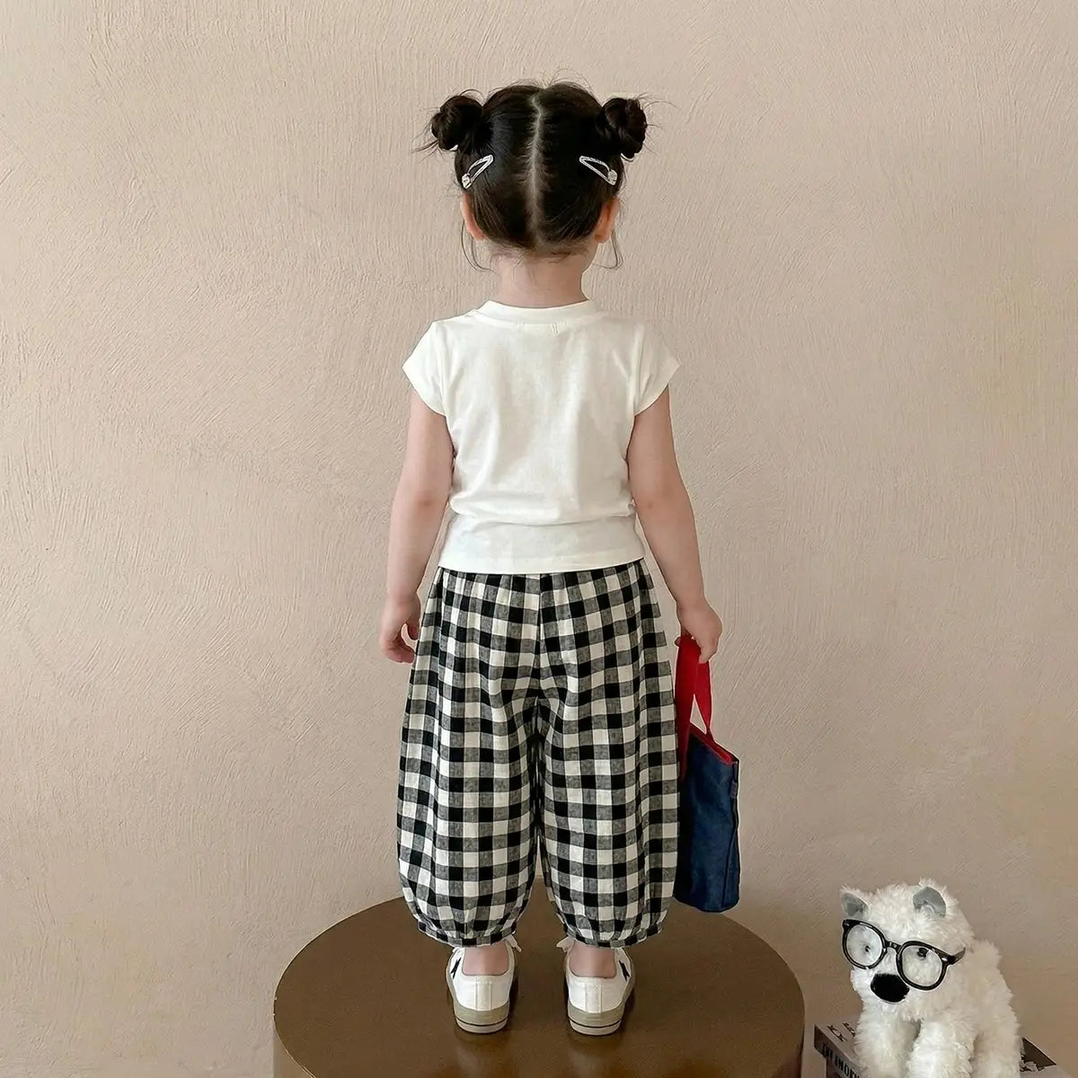 Girls Off White Cape Sleeve Top With Checked Pants Sets Sets