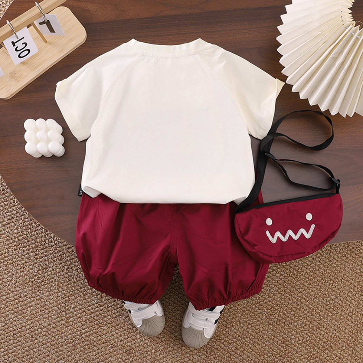 Boys Printed Applique T-Shirt With Maroon Sling Bag And Shorts Set Sets