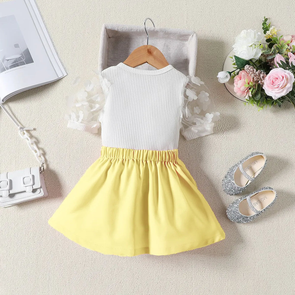 Girls Ribbed Short Sleeve Top With Yellow Pleated Skirt Sets 2 pc. Sets
