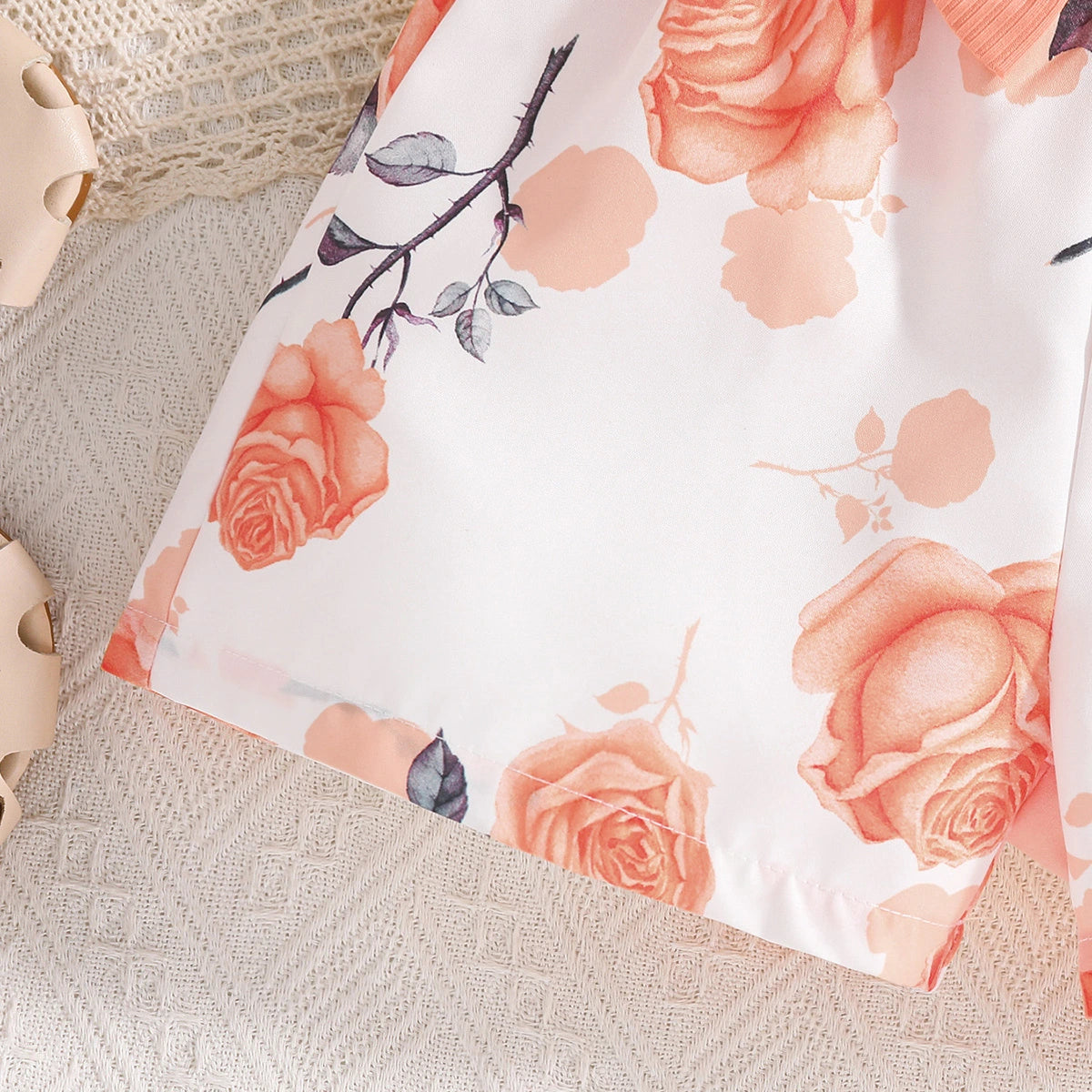 Girls Peach Floral Print Flutter Sleeve Romper Playsuits