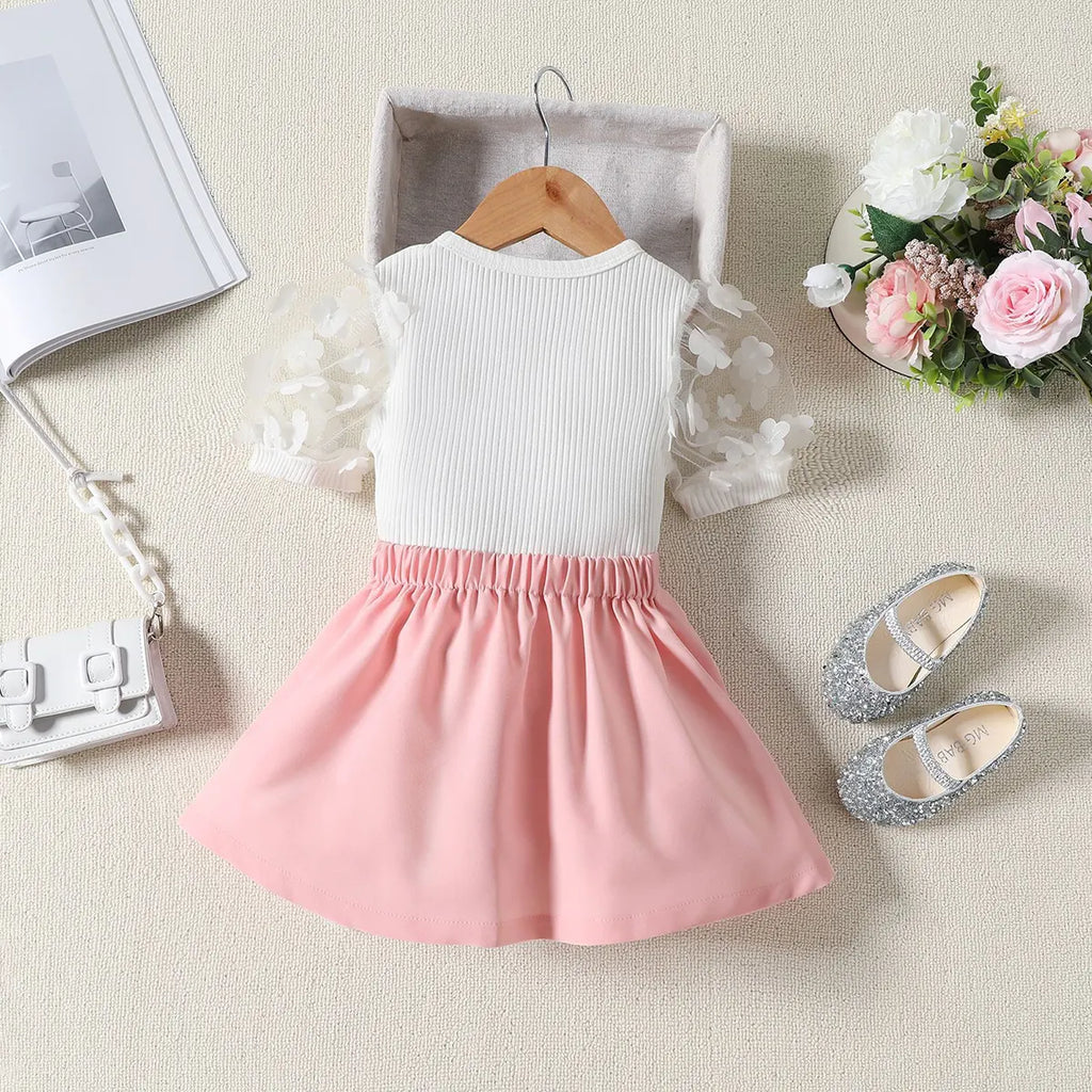 Girls Ribbed Short Sleeve Top With Light Pink Pleated Skirt Sets 2 pc. Sets