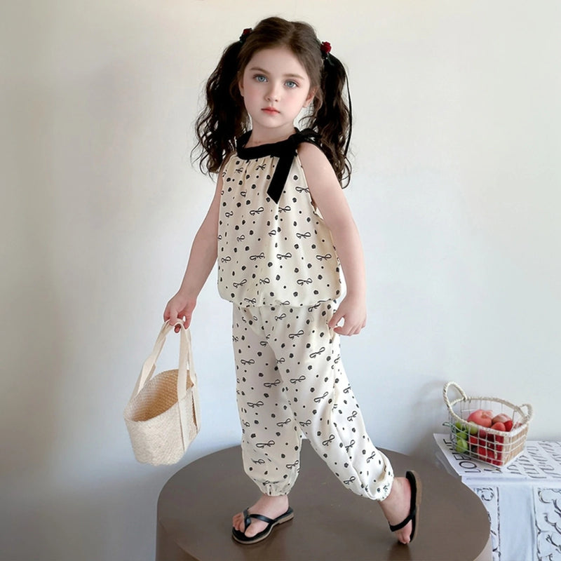 Girls Cream Bow Print Sleeveless Top With Elasticated Pants Sets Sets